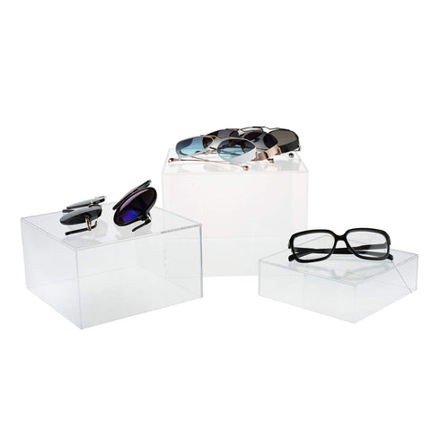 Red Co. transparent cube with lighting underneath, enhances product presentation