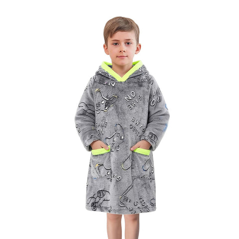Redair kid wearing hoodie blanket in living room for relaxed gaming comfort
