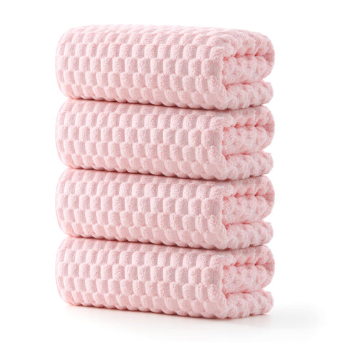 REDKISS front view of folded pink towel set shows coordinated color and softness