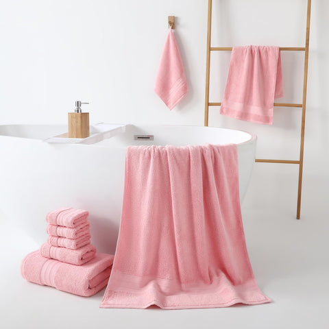 REDKISS folded hand towel close-up demonstrating soft texture and quick-dry benefit
