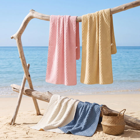 REDKISS towel beside measuring tape showing extra-large size and coverage benefit