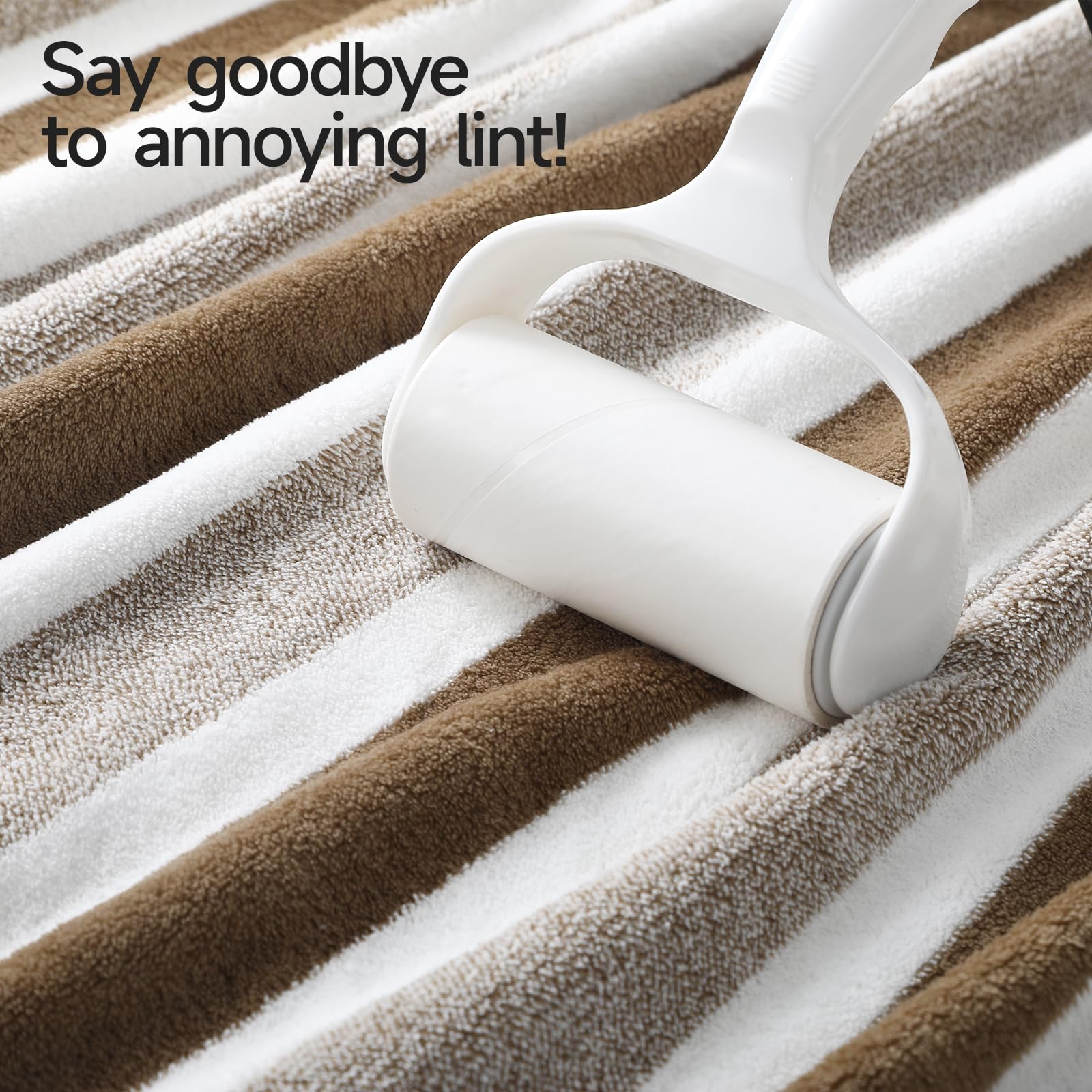 REDKISS bath towel next to person showing oversized coverage and fit