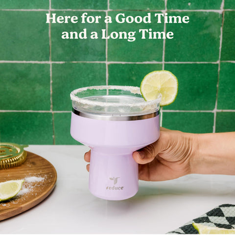 REDUCE Saltini held in hand to show size and portability for on-the-go entertaining