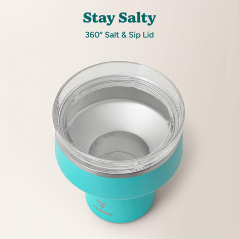 REDUCE Saltini in hand displaying 16oz size and portability for outdoor events