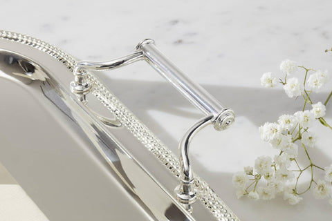 Reed & Barton tray edge and corner profile emphasizing refined silhouette