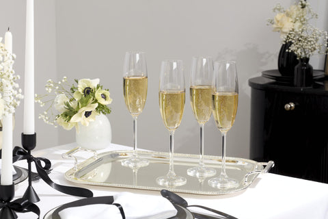 Reed & Barton mirror finish reflecting light to enhance tabletop displays