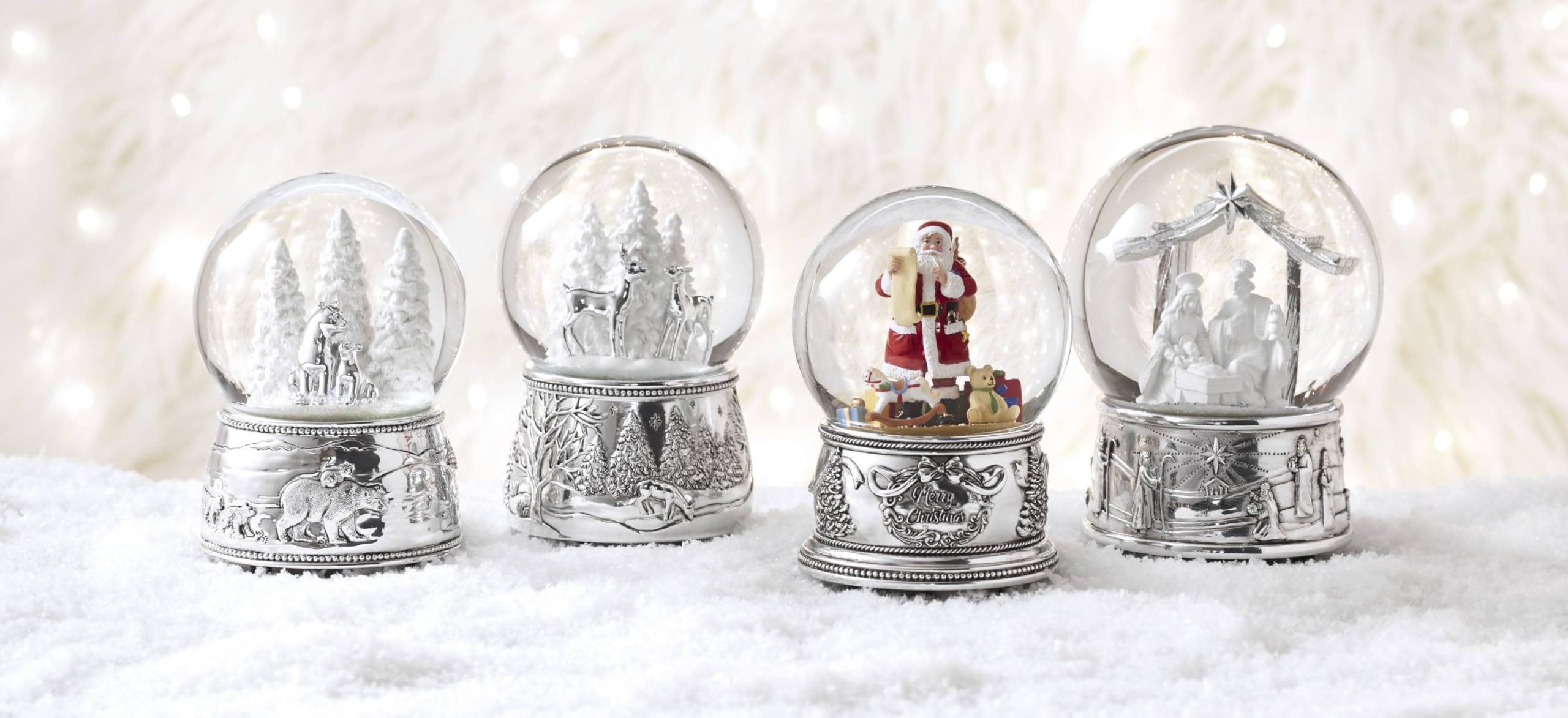 Reed & Barton musical snow globe displayed on mantel adding seasonal warmth and tradition