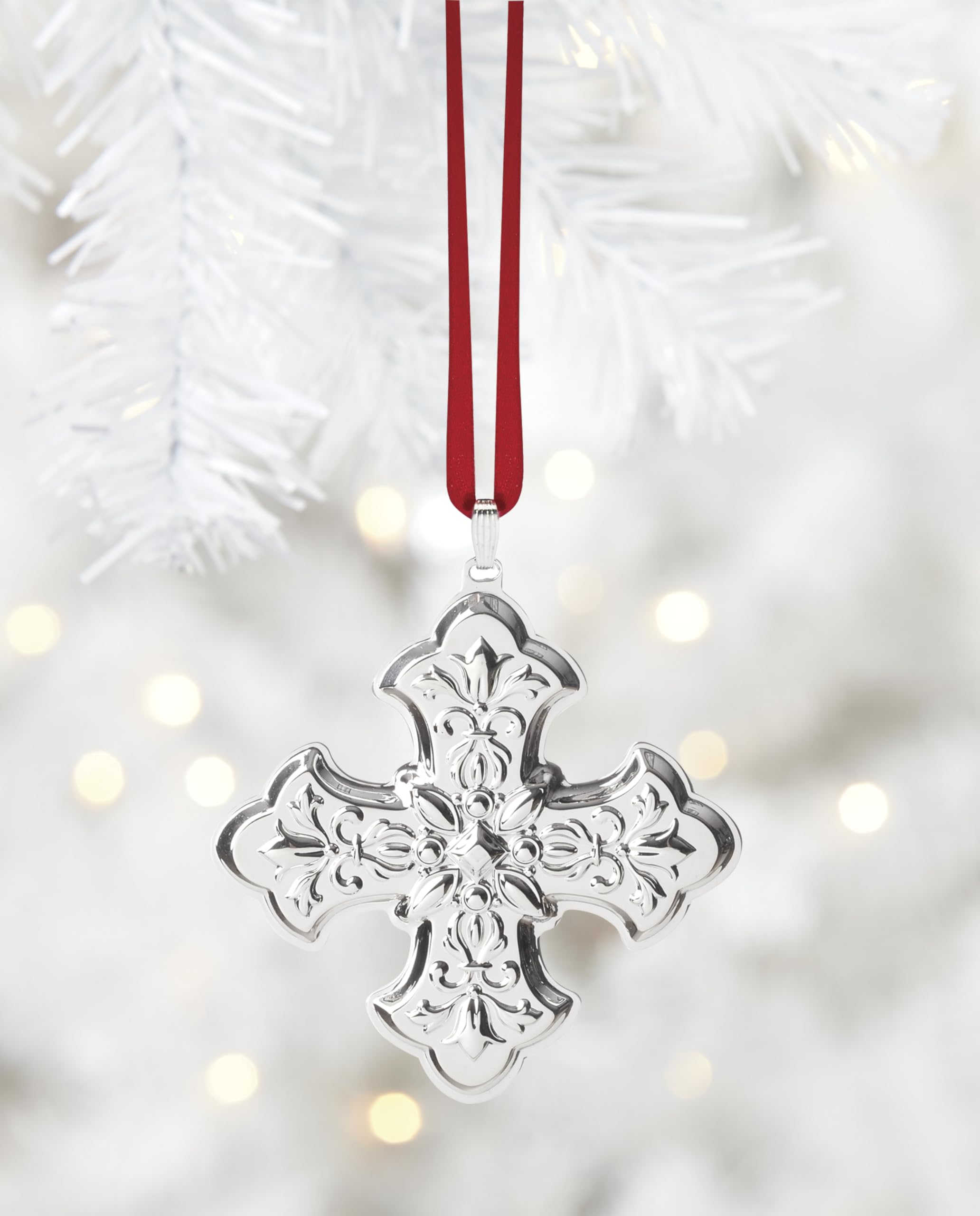 Reed & Barton ornament held in hand showing scale and portability benefit
