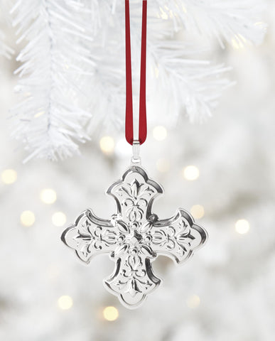 Reed & Barton ornament held in hand showing scale and portability benefit