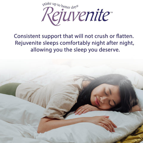 RejuveNite pillow next to hand showing scale and resilient, springy feel