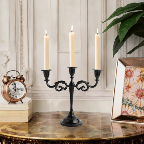 RELY+ candelabra on a dining table with place settings showcasing ambient mood lighting