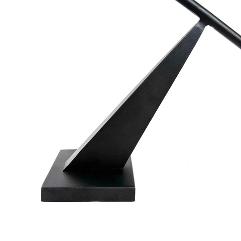 Remenna base detail showing weighted metal base for stability and reliable support