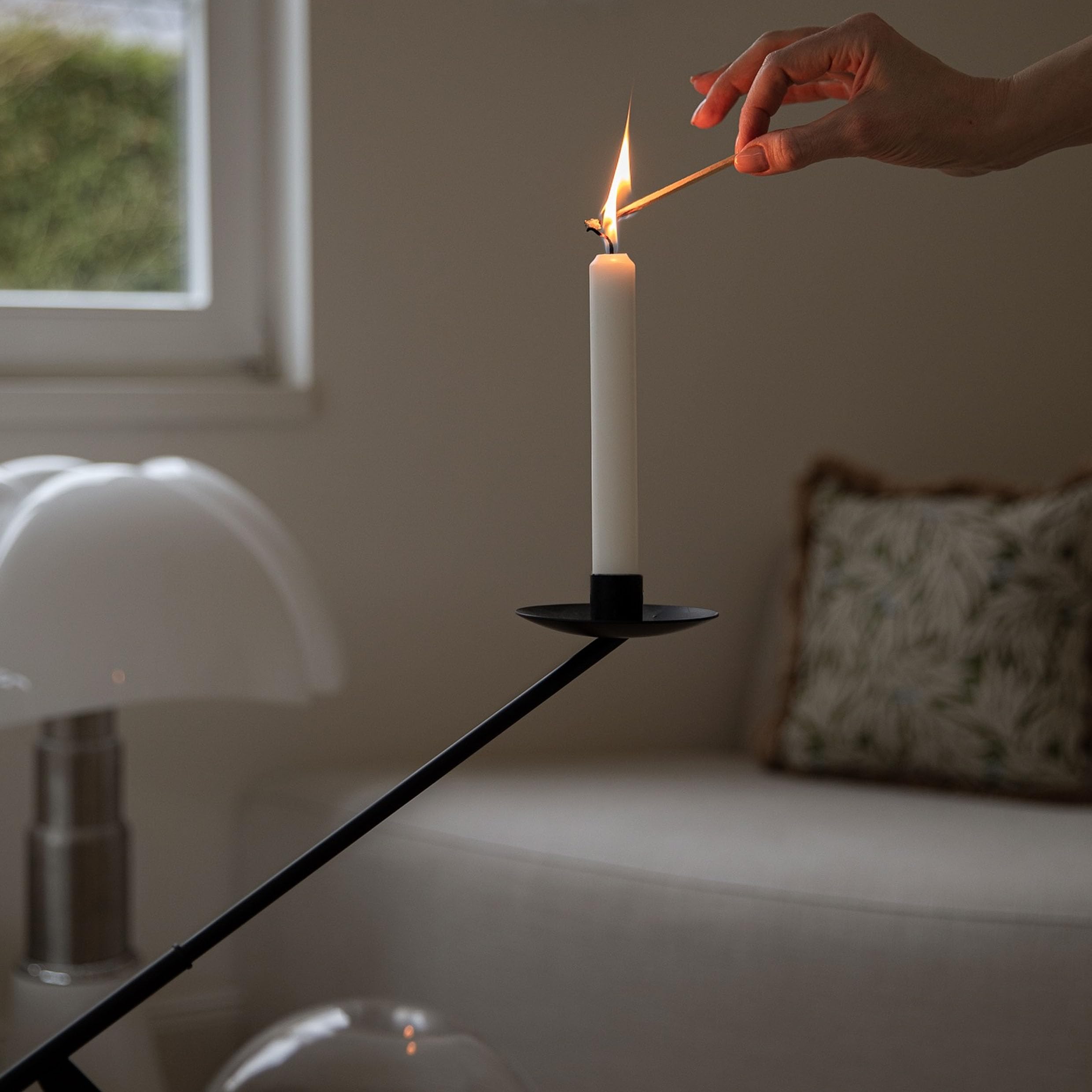Remenna candlestick beside a book showing 19 inch scale and proportion benefit