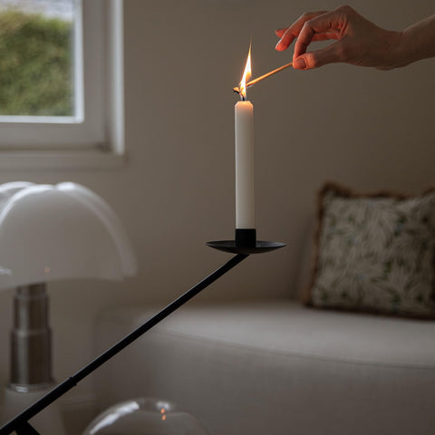 Remenna candlestick beside a book showing 19 inch scale and proportion benefit