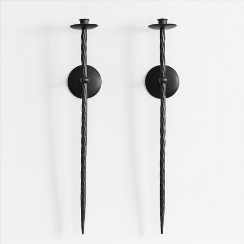 Remenna front view showing pair of black twisted wall candle holders, adds dramatic accent