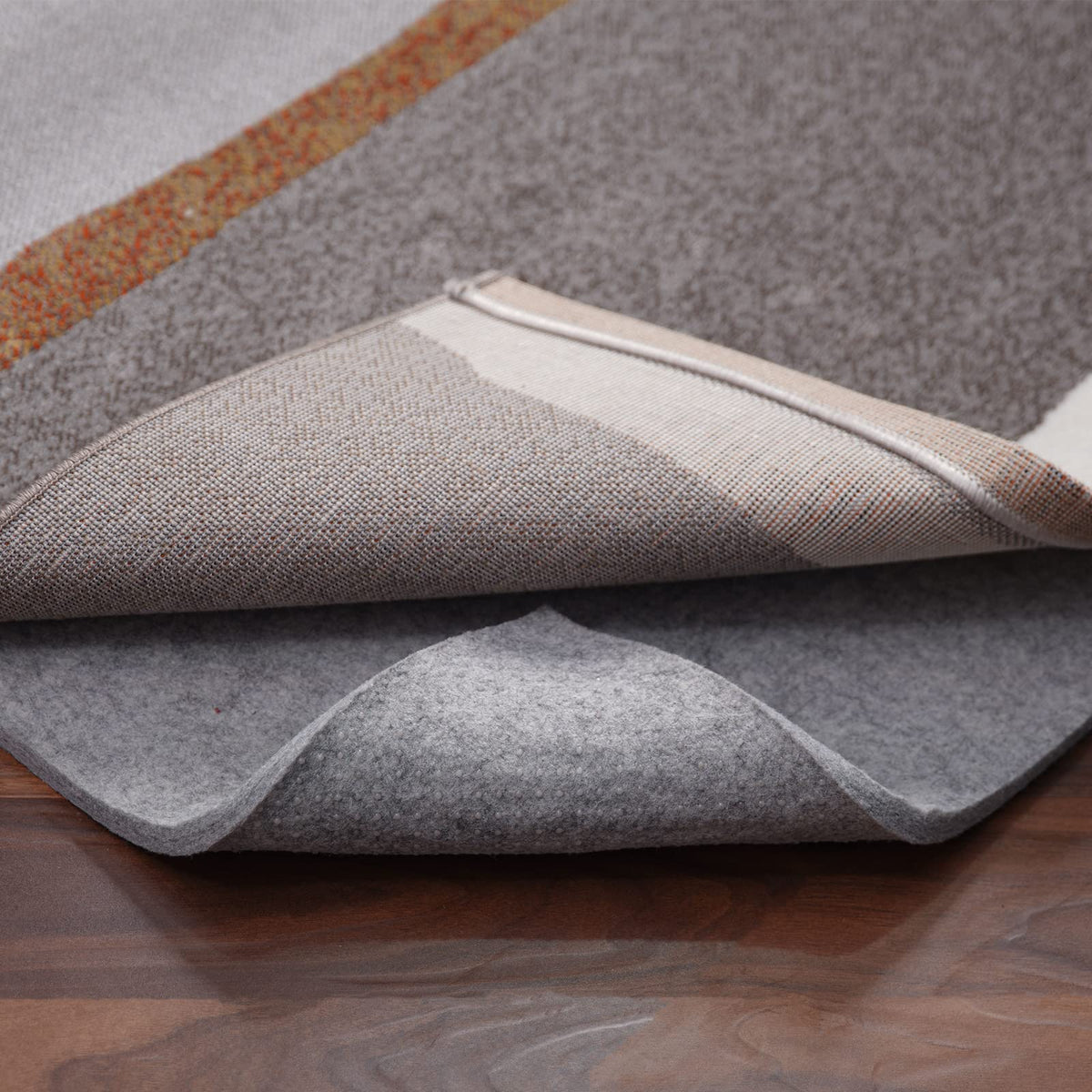 RESARE front packaging of 9x12 rug pad showing size and benefits