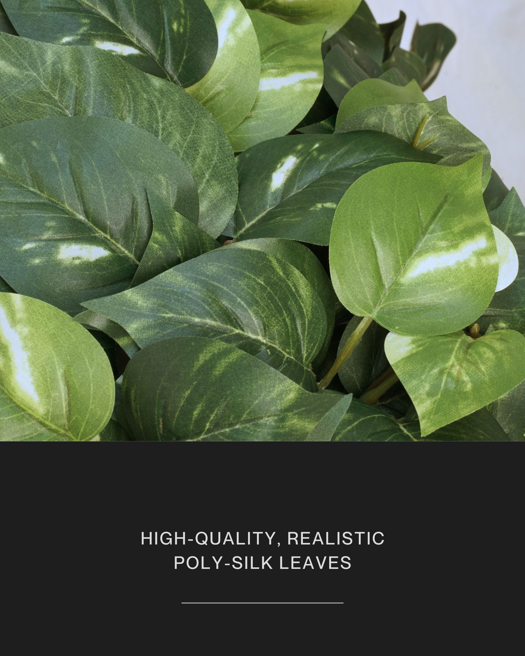 Retrograde faux pothos staged in included minimalist pot for instant tabletop greenery