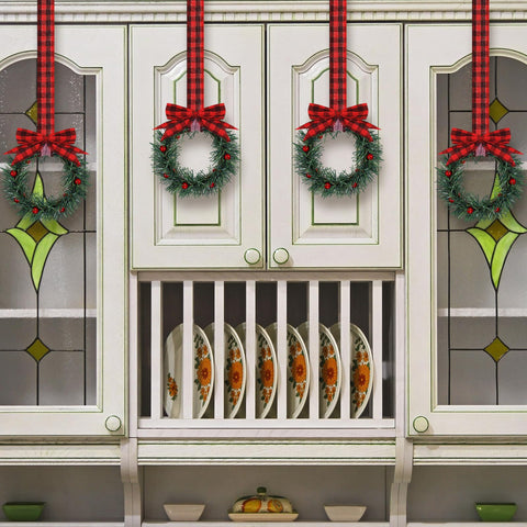 Retrowavy wreath held in hand showing scale and easy hanging