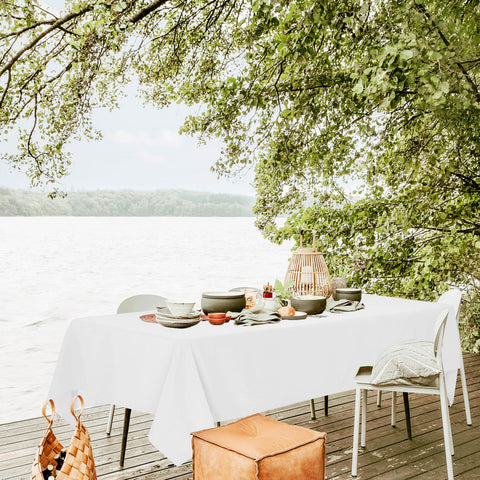REWOMC draped on 8ft banquet table demonstrating 15-inch drop and neat fit