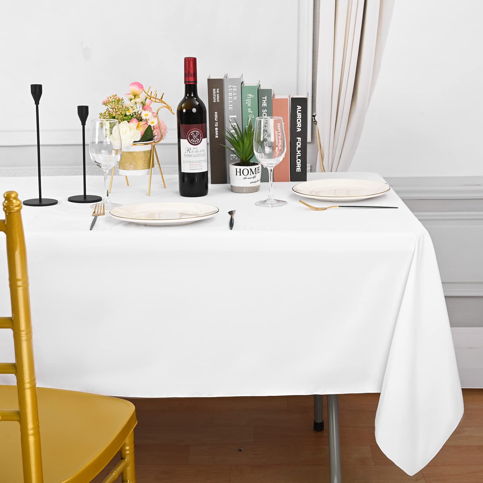 REWOMC tablecloth beside ruler indicating accurate 60x126 inch sizing