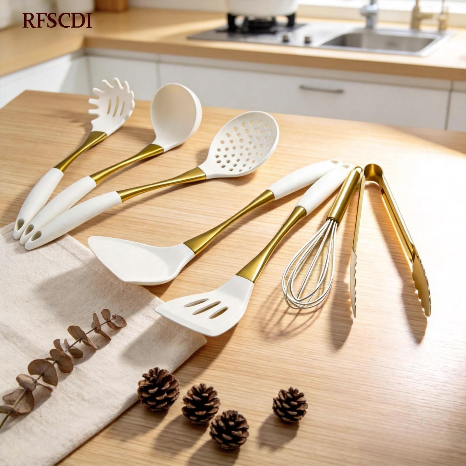 RFSCDI close-up of gold stainless-steel handle highlighting comfortable white silicone grip and stability