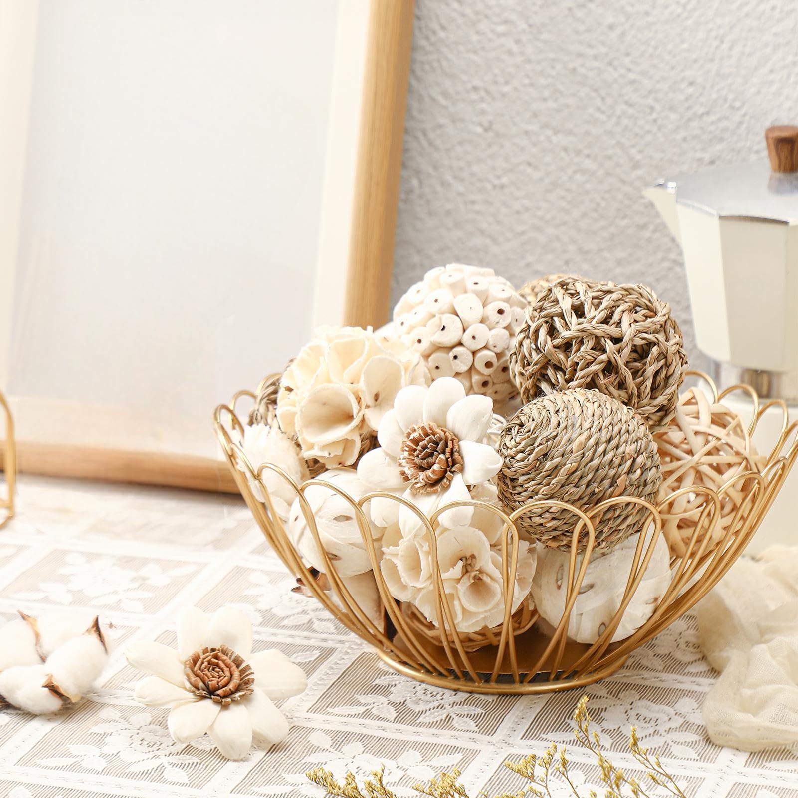Riceshoot bowl filled with assorted potpourri balls illustrating layered decor effect