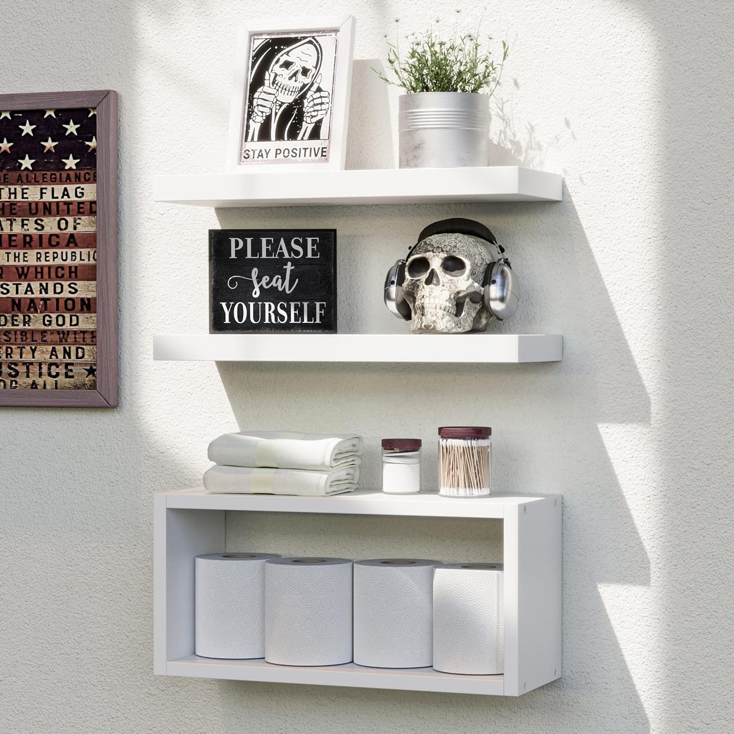 RICHER HOUSE front view of white floating shelves showing neat storage benefit