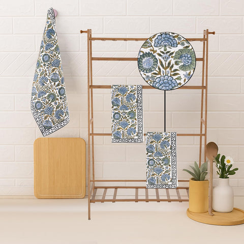 Ridhi towel next to utensils for scale, showing 16x28 inch practical size