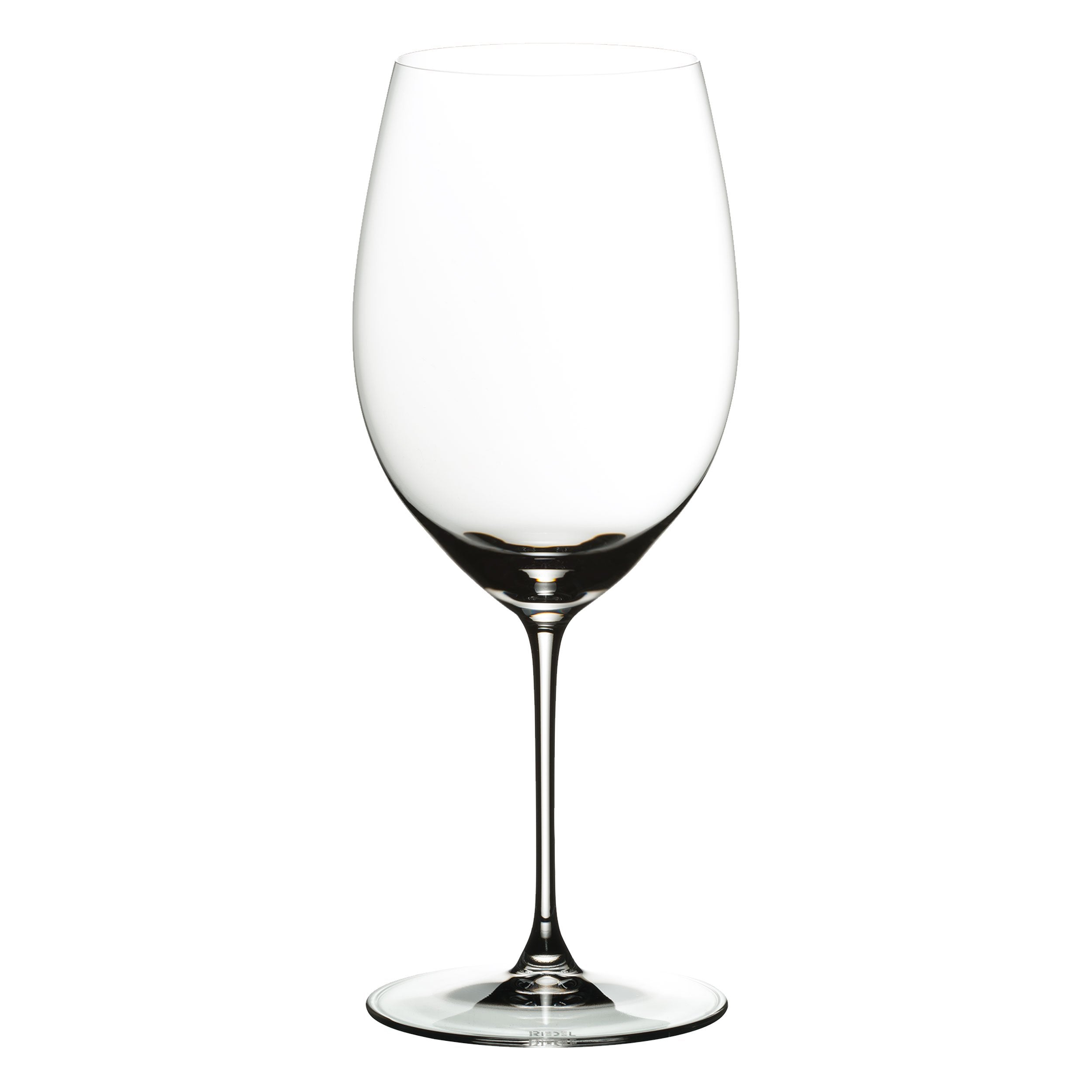 Riedel Veritas glass held in hand demonstrating thin rim and refined balance