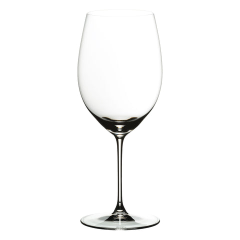 Riedel Veritas glass held in hand demonstrating thin rim and refined balance
