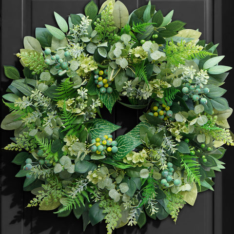 Rimalo wreath on front door adding welcoming greenery and curb appeal
