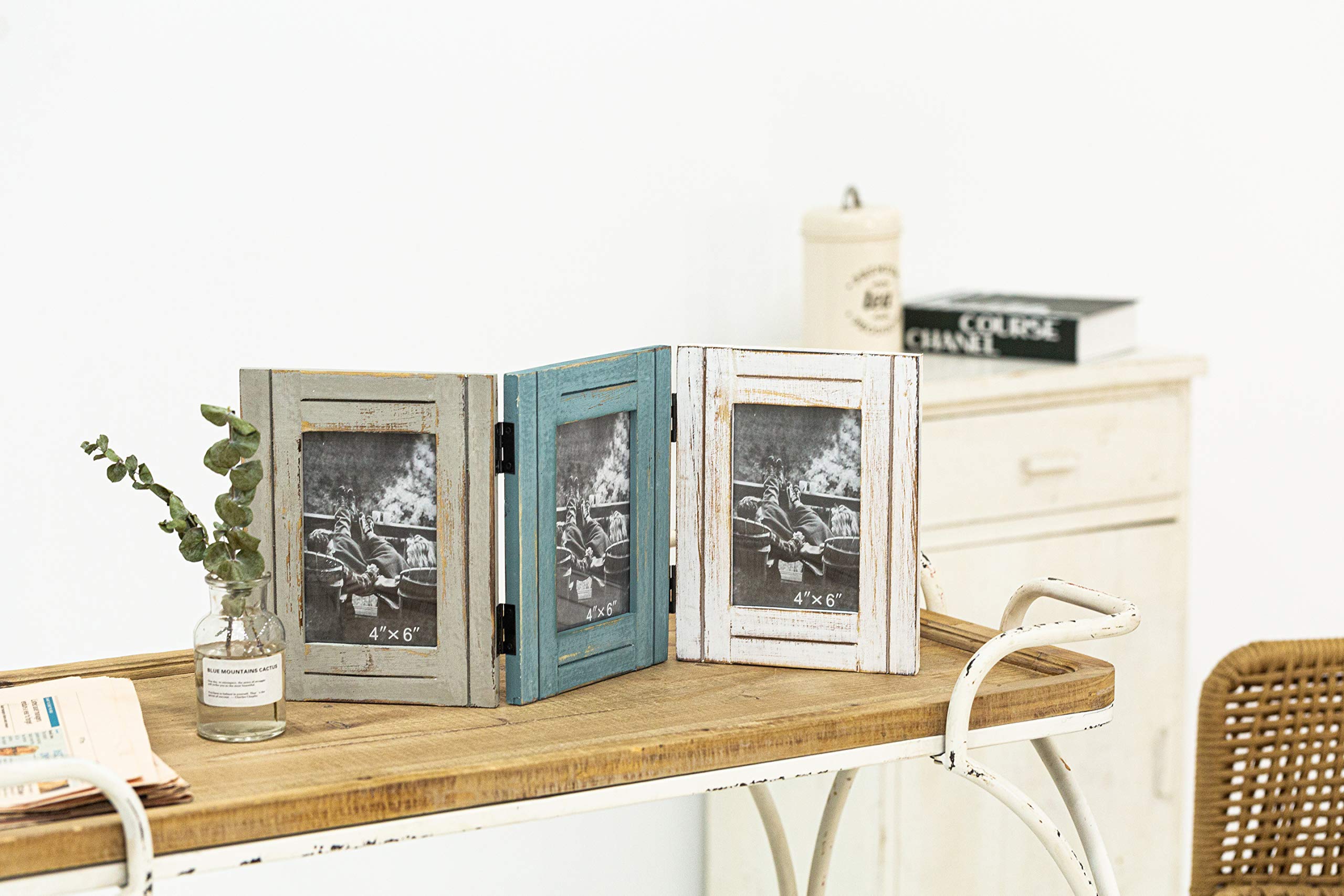 RiteSune holding kids artwork and photos demonstrating family use