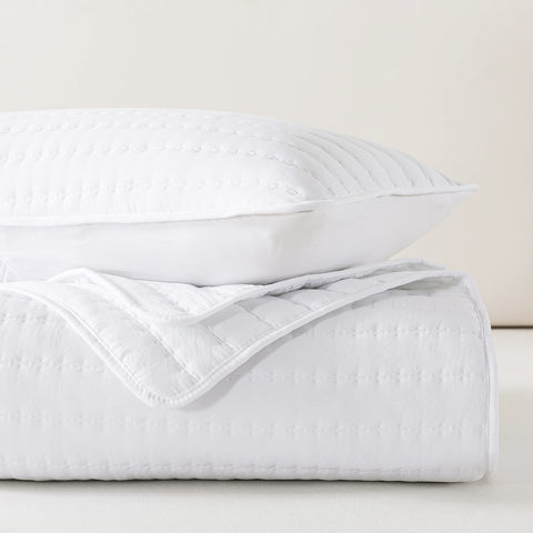 ROARINGWILD quilt spread on king bed showing full coverage and ideal drape for mattress fit