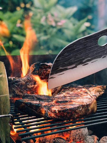 ROCOCO cleaver on outdoor grill table showing portability and rugged use