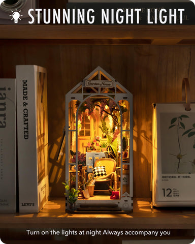 Rolife garden house next to hardcover books showing compact bookshelf fit