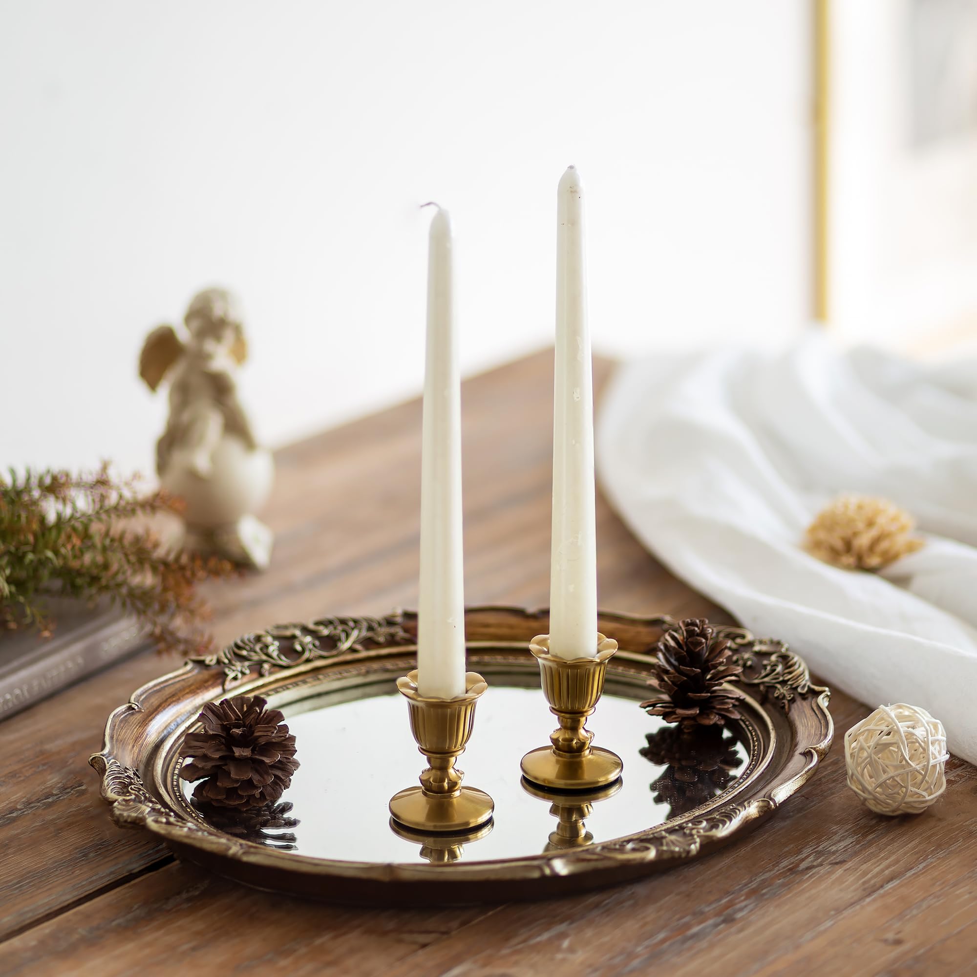 Romadedi displayed on mantel with garland showing festive decorative use