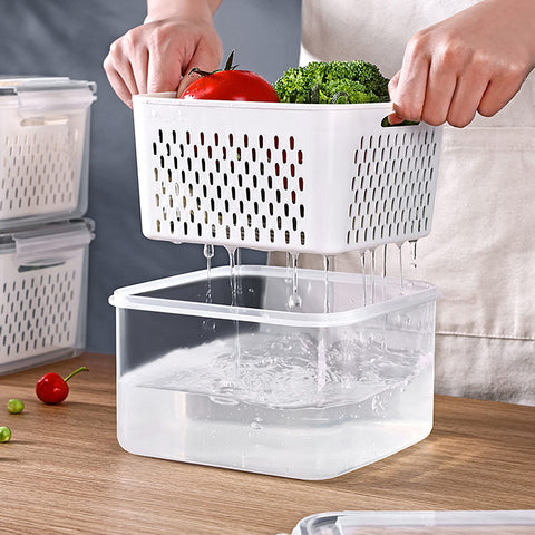 Ronanemon in use washing berries inside container for faster prep