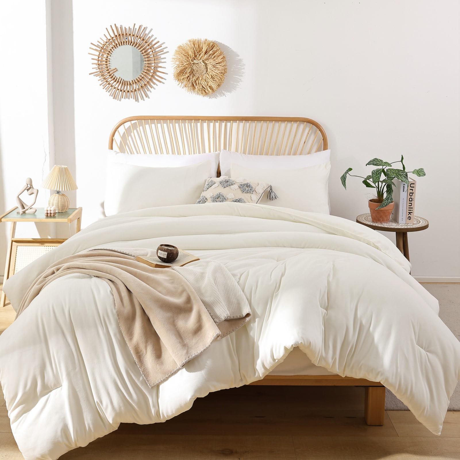 ROSGONIA styled bedroom with ivory comforter conveying calming boho ambiance