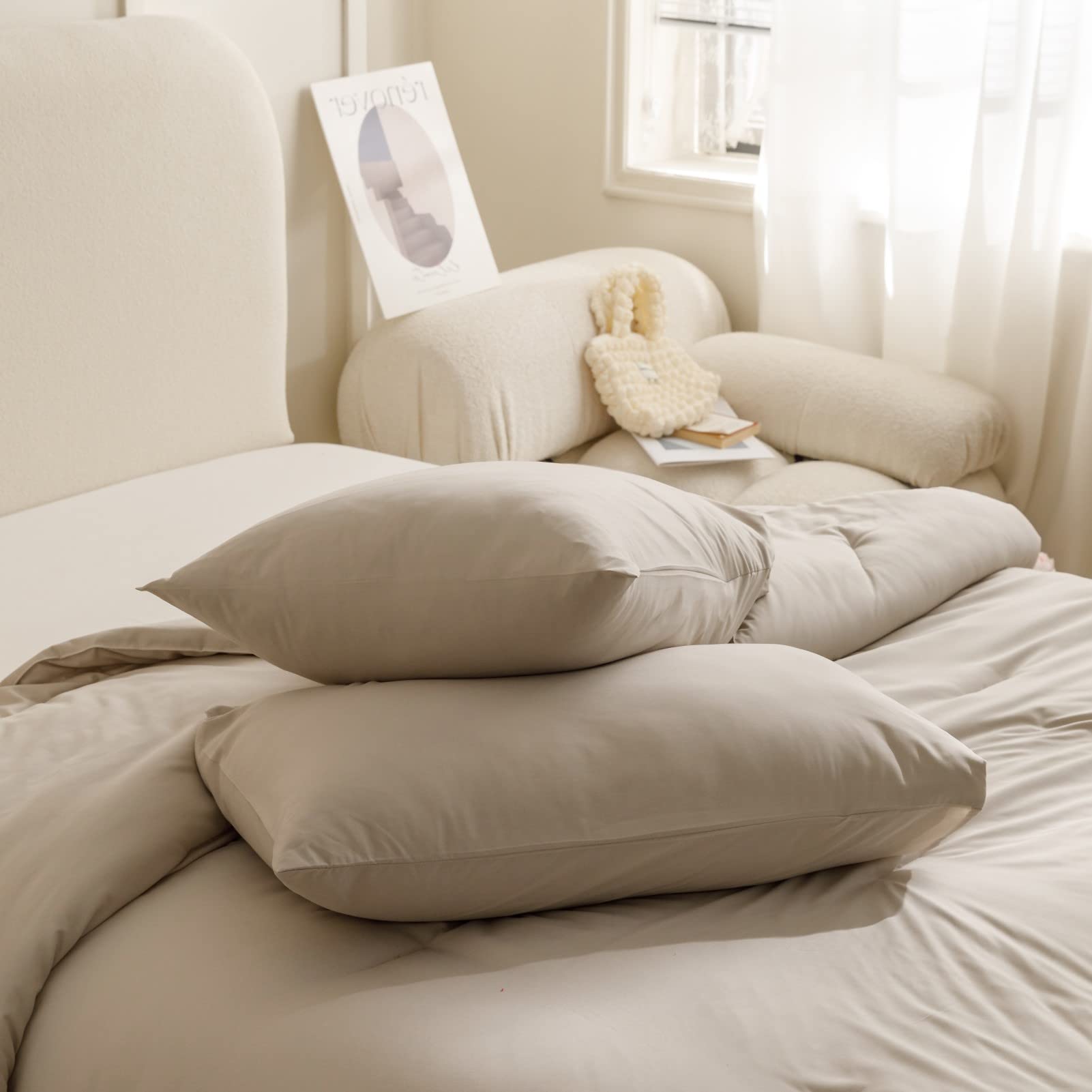 ROSGONIA comforter folded to show compact storage and easy handling benefit