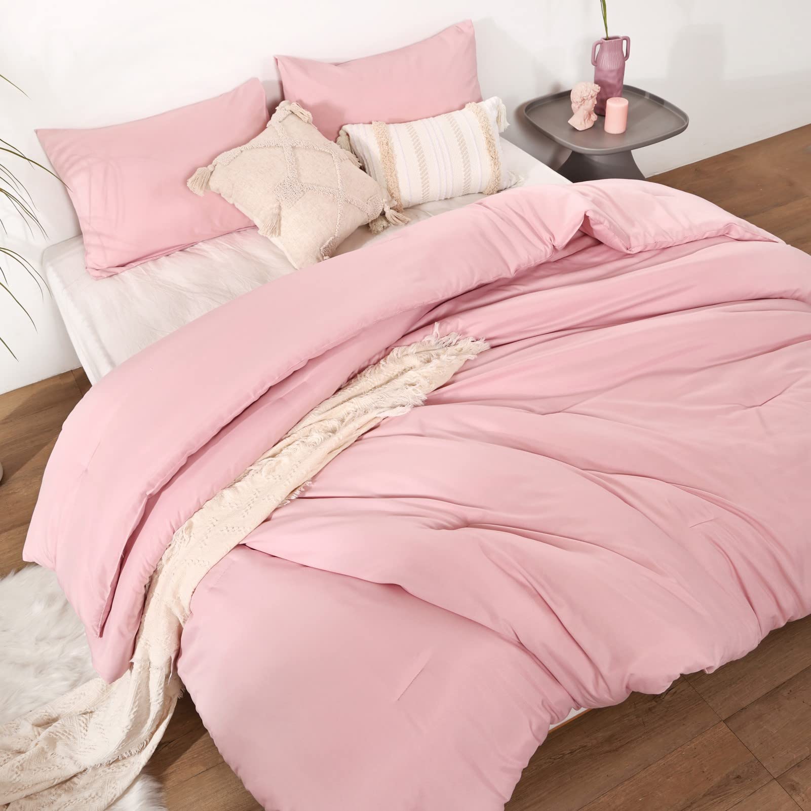 ROSGONIA comforter styled on bed creating a calm boho bedroom vibe