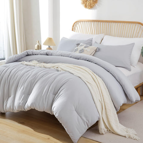 ROSGONIA comforter laid on queen bed demonstrating generous drape and neutral style