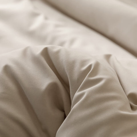 ROSGONIA comforter with person to show scale and full California King coverage benefit