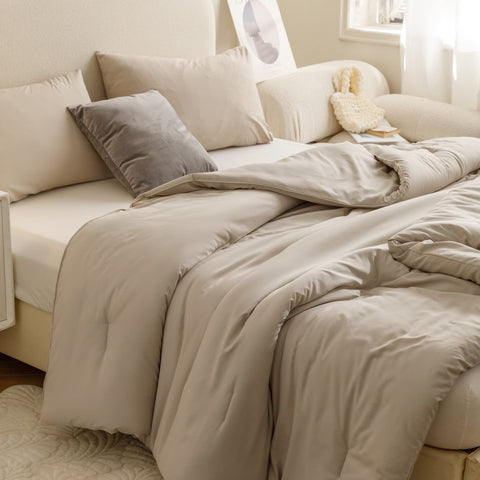 ROSGONIA front view oversized king comforter shows full drape and elegant oatmeal tone