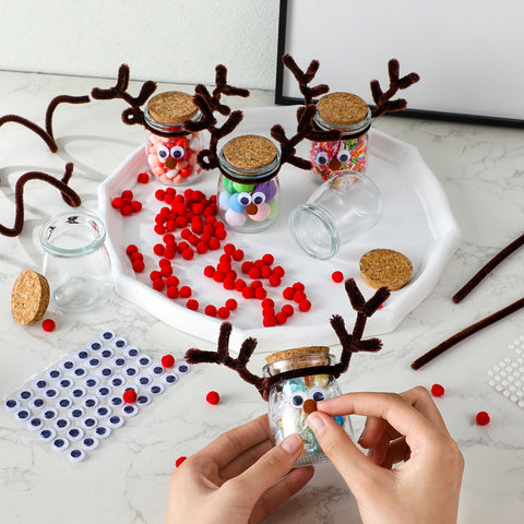 Roshtia party table with finished reindeer jars used as festive favors