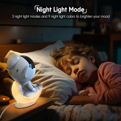 Rossetta projector casting colorful galaxy and green stars across ceiling, immersive ambiance