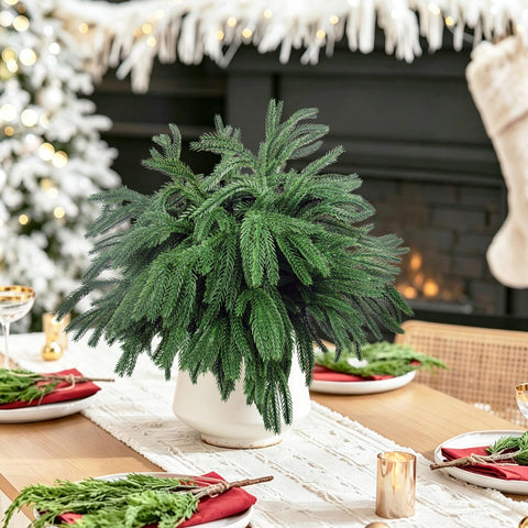 Rowfad table centerpiece with Norfolk pine creating a low-maintenance focal point