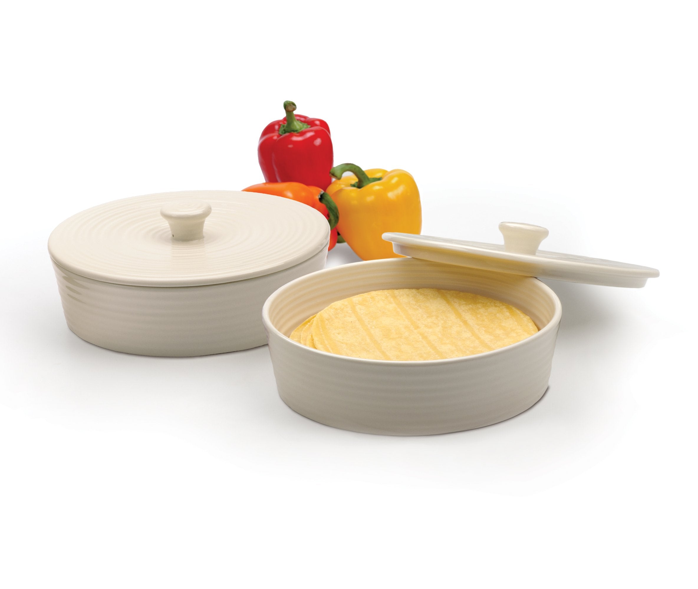 RSVP International warmer on dining table with food, elegant presentation benefit