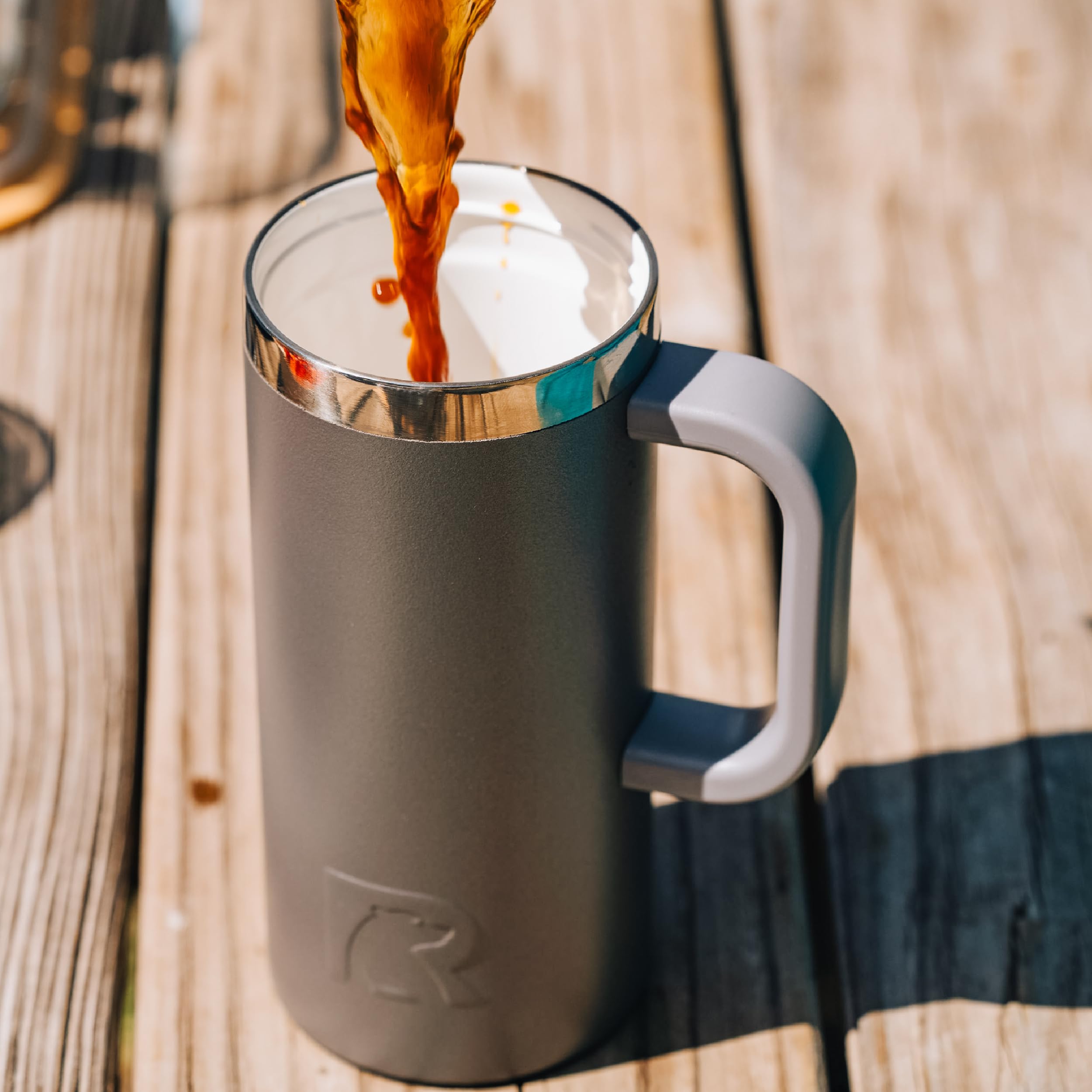 RTIC mug seated in car cup holder illustrating travel stability benefit