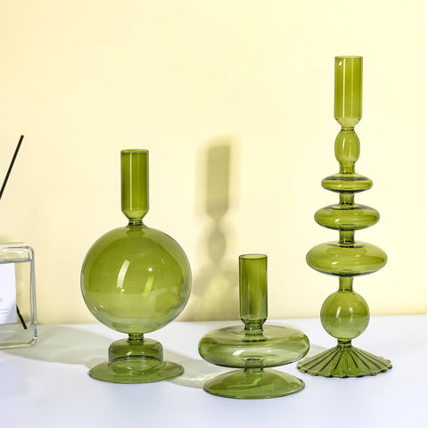 Rtteri front view of three green glass candlesticks showing elegant tiered display and ambiance