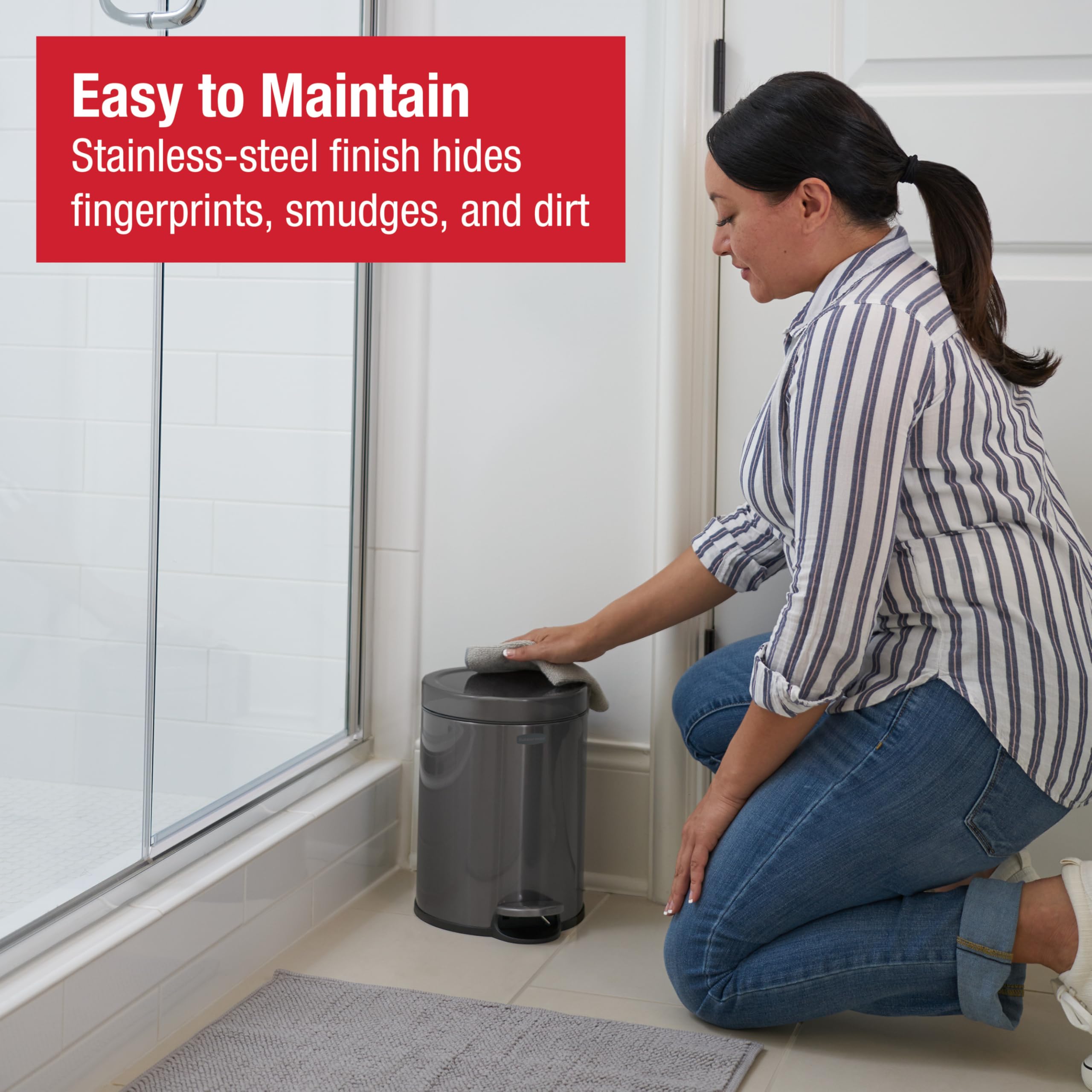 Rubbermaid bag cinch securing liner to prevent slipping during disposal